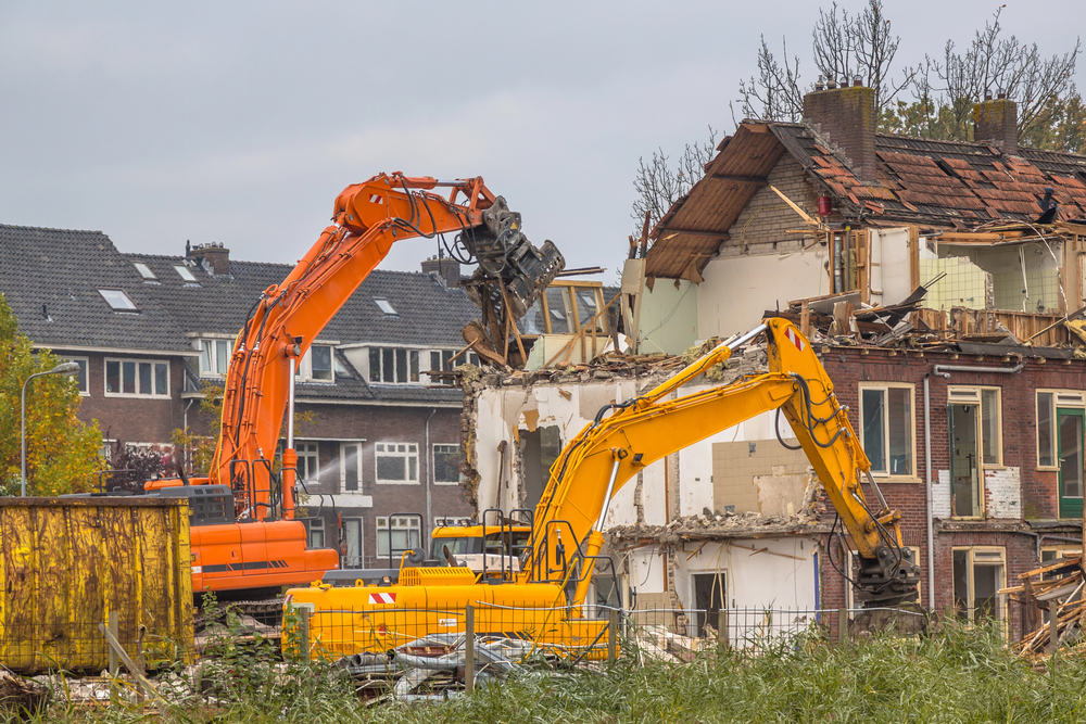 kranen slopen een huis in nederland